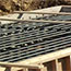 switch yard construction: metal pipes are placed in wet cement