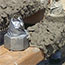 switch yard construction: wet cement is placed on wooden beams to build structure