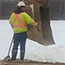 access road & culvert installation construction: land surrounding pipe is filled in